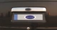 Нержавеющая хромированная планка для номера с местом под логотип для Ford от Carmos (нержавейка) - изображение 1