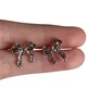 Серьги-клипсы Бантики ChengSe 1,5*1,3см серебристые - изображение 1