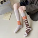Гольфы с асиметричным рисунком бежевые 35-40 - изображение 1
