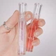 Жидкий блеск для губ в кораловом оттенке Rom&nd Glasting Water Gloss #01 Sanho Crush - изображение 4