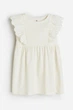 Платье из джерси с воланами кремовое H&M 122-128см (400097392) - изображение 1