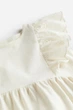 Платье из джерси с воланами кремовое H&M 122-128см (400097392) - изображение 2