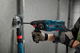 Набор Перфоратор сетевой Bosch Professional GBH 220, 720 Вт, 2дж, 4800 уд.мин, чемодан (06112A6020) + Лазерный дальномер Bosch Professional GLM 50-22 с чехлом и батарейками (0601072S00) - изображение 15
