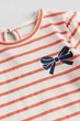 Футболка теракотова Бант H&M 68см (400098333) - зображення 2