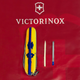 Нож Victorinox Spartan Ukraine 91мм/12функ/марка с трактором/желтый - изображение 6