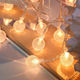 Светодиодная гирлянда "Шарики прозрачные" 20 LED, 5м + переходник, 220V, IP44, Теплый белый - изображение 7
