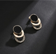 Золотисти сережки з чорним акцентом і цирконіями Bijoux-e - изображение 2