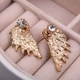 Серьги-гвоздики с камнем Крылья легкости золотистые - изображение 1