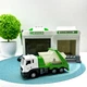 Гараж с машинкой Chengmei Toys Мусоровоз с контейнером с световыми и звуковыми эффектами Бело-зеленый (CLM-552) - изображение 1