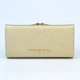 Гаманець жіночий шкіряний класичний на кнопці з монетницею 18x9x3 см Золотистий - зображення 4