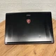 Игровой ноутбук Б-класс MSI GE72VR 7RF Apache Pro / 17.3" (1920x1080) TN / Intel Core i7-7700HQ (4 (8) ядра по 2.8 - 3.8 GHz) / 16 GB DDR4 / 128 GB SSD M.2 + 1000 GB HDD / nVidia GeForce GTX 1060, 3 GB GDDR5, 192-bit / WebCam б/у - изображение 3