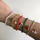 Набір новорічних браслетів з підвіскою дзвіночки "Festive Christmas" Honey Fashion Accessories різнокольоровий (120270) - изображение 10