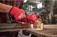Ленточная шлифмашина Milwaukee M12 FBFL13-402В 13 мм (+ зарядное устройство, 2 аккумулятора, сумка для инструментов) (4933480961) - изображение 4