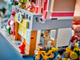 Zestaw klocków LEGO Friends Mieszkania i sklepy w mieście Heartlake 2040 elementów (42670) - obraz 9