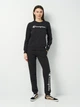 Спортивные штаны на флисе женские Champion 113219-KK003 S Черные (8054112525441) - изображение 3