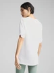 Спортивная футболка для бега женская Puma Evostripe Relaxed Tee 68504802 XS White (4067983636523) - изображение 2