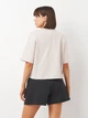 Футболка хлопковая оверсайз короткая женская Adidas W Bl Sj Bf T JG8729 XS Wonalu/White (4067902913056) - изображение 2