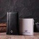 Жіноча шкіряна ключниця ST Leather чорна на кнопках з відділенням для купюр та 6 карабінами 12х7 5 см 55987 - зображення 8
