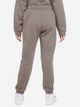 Spodnie dresowe dziewczęce ocieplane Nike G Nsw Trend Flc Cf Pant DZ4616-040 XS (122-128 cm) Brązowe - obraz 2