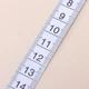 Измерительная рулетка / лента для объемов талии / тела / груди / мышц с фиксатором Centímetro компактный двусторонний швейный сантиметр с ручкой и автоматическим скручиванием (см + дюймы), 1.5 м, черный (100775467) - изображение 3