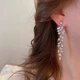 Серьги женские длинные в форме Веточка с листьями сияющая со стразами 2 шт. Серебристый - изображение 6