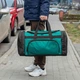 Дорожная сумка biz черно-зеленая тканевая для тренировок и поездок на 60 литров - изображение 12