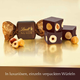 Конфеты Lindt Nuxor Dark из чёрного шоколада с целыми лесными орехами, 150г - изображение 3