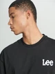 Футболка хлопковая длинная мужская Lee L231736 L Черная с принтом (8682344541900) - изображение 4