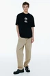 Футболка с принтом H&M Loose Fit M чорний 1034065085 - изображение 1