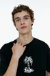 Футболка с принтом H&M Loose Fit M чорний 1034065085 - изображение 2