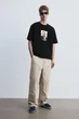 Футболка H&M Loose Fit L чорний 1238203013 - изображение 2