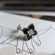 Серебряное кольцо с натуральным ониксом, фианитами, вес изделия 3,29 гр (60002142) - изображение 5