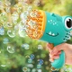 Детский пистолет пулемет на батарейках Bubble Gun Dinosaurus 17 см генератор мыльных пузырей автоматический Зеленый - изображение 2
