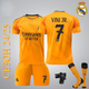 Футбольна форма Real Madrid VINI JN. (Вінісіус Жуніор) 7, сезон 24/25 з гетрами (розмір 34-38) та щитками, розмір 22 на зріст 125-130 см, помаранчева - зображення 1