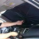Автомобильный солнцезащитный зонт-шторка на лобовое стекло 133×75 см, серебристый снаружи / черный внутри - изображение 3