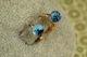 Сережки дитячі Xuping Jewelry Сваровські хамелеон багатогранність із блакитними каменями 1 см золотисті - зображення 5