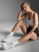 Спортивный топ женский 2XU Aero Mesh Medium Impact Bra WR7348a_WHT/SRF XS Белый (9359420074070) - изображение 5