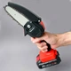 Міні пила Mini Electric Chain Saw у валізі для обрізання дерев та розпилу дров 24V Червона для дому, дачі, саду, ремонту, будівництва, демонтажу - зображення 1