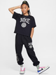 Підліткова футболка для дівчинки Nike G Nsw Tee Graphic Star HM6303-010 147-158 L Чорна (197602727449) - зображення 4