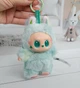 Игрушка-брелок Labubu Лабубу в костюме мятного цвета, 17 см - изображение 6