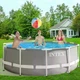 Бассейн каркасный Intex 26706-4 круглый на 6500 л из ПВХ и стали с картриджным насосом лестницей тентом и подстилкой 305x99 см Серый (124-9-26706-4) - изображение 8