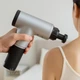 Массажер для тела и мышц аккумуляторный Fascial Gun, беспроводной массажный пистолет с 4 насадками и 6 скоростями, портативный электрический вибромассажер для глубокого массажа спины, шеи, ног, рук Серый, KH-320-Gray - изображение 2