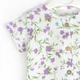 Песочник Dexter`s для девочки на пуговичках с цветочками flower garden 62 см белый - изображение 3