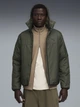 Куртка демисезонная с капюшоном мужская Puma Outerwear Essentials 68829670 3XL Dark Olive (4069157413084) - изображение 1