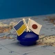 Значок Dobroznak Прапори України/Японії (6063) - изображение 1