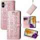 Чохол Embossed Cat and Dog для Samsung Galaxy A06 / A065 книжка шкіра PU з візитницею рожеве золото - зображення 1