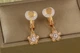 Сережки кліпси Xuping Jewelry миозонис 2,7 см золотисті - зображення 1