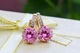 Серьги Xuping Jewelry с большим розовым камнем и круглой застежкой 2 см золотистые - изображение 1