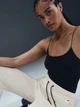 Спортивные штаны на флисе женские Nike W Nsw Tch Flc Mr Jgger 2 HV6779-133 M Молочные (0198485461529) - изображение 7