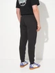 Спортивные штаны мужские утепленные Puma Essentials Graphics 68818701 S Black (4069156535664) - изображение 2